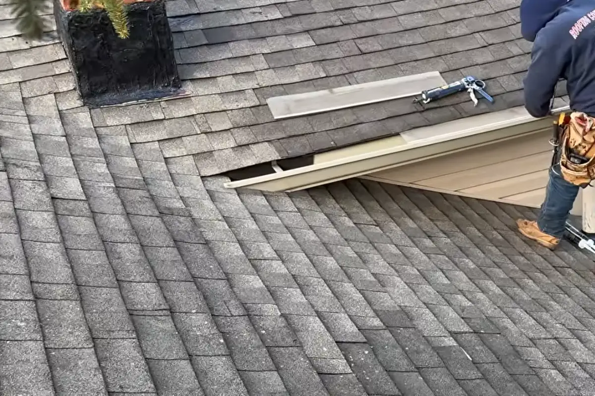 The same asphalt shingle roof after new shingles were installed by our crew